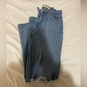 Double knee cut out medium wash jeans